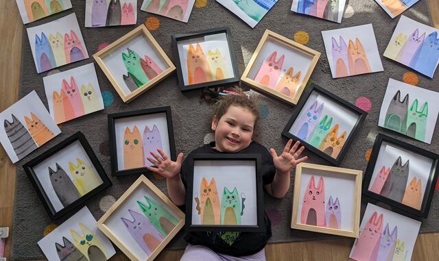 Lily-Rose and her 'Squidgy cat' paintings