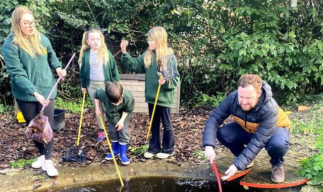 StNichoutdoor-exploring the pond2