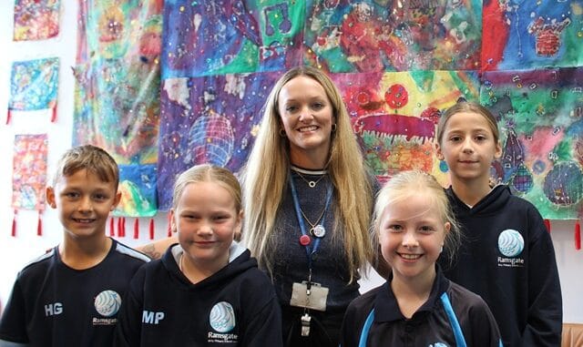 RAPSonepic - Art teacher Kelly Ann Smith with pupils in the gallery