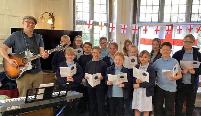 NEWINGcarehomesinging - Newington's young singers with music teacher Warwick Eldred at Shottendane Nursing Home in Margate for Intergenerational Week 2026.